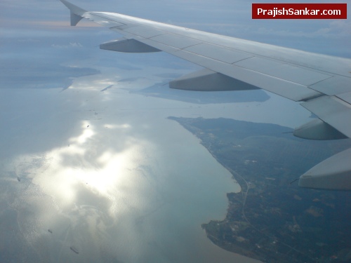 I can see land, sea, ships and suns reflection on water.. a nice view I can see land, sea, ships and suns reflection on water.. a nice view