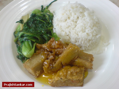 Vegetarian lemon soya chicken with rice vegetable soup and chinese tea