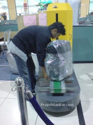 Plastic wrapping service at LCCT airport. It cost me RM8 to wrap my backpack luggage bag. Plastic wrapping service at LCCT airport. It cost me RM8 to wrap my backpack luggage bag.